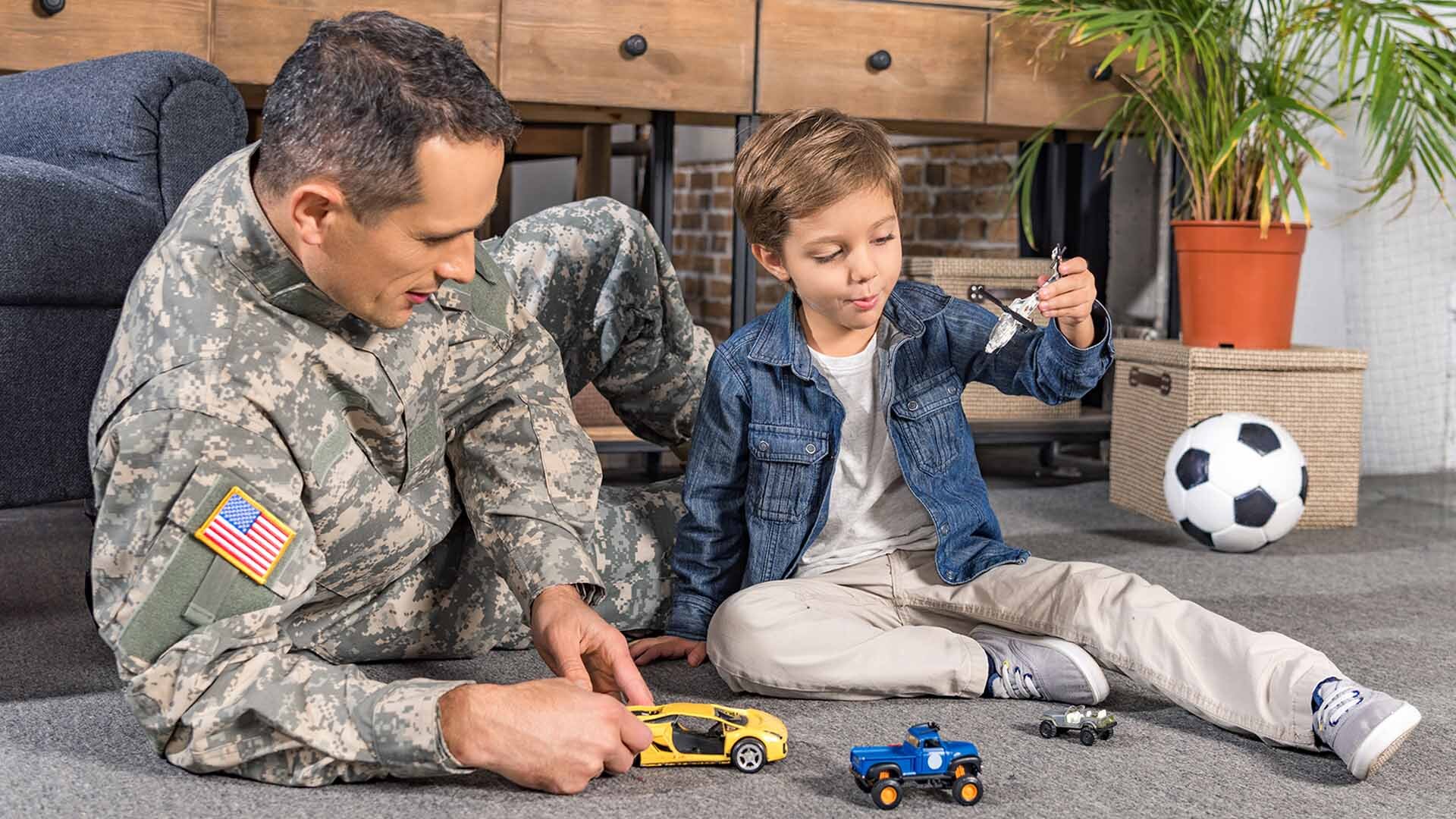 Military father playing with son