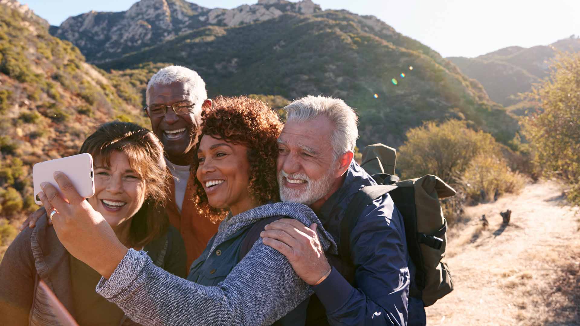 Two retired couples hiking